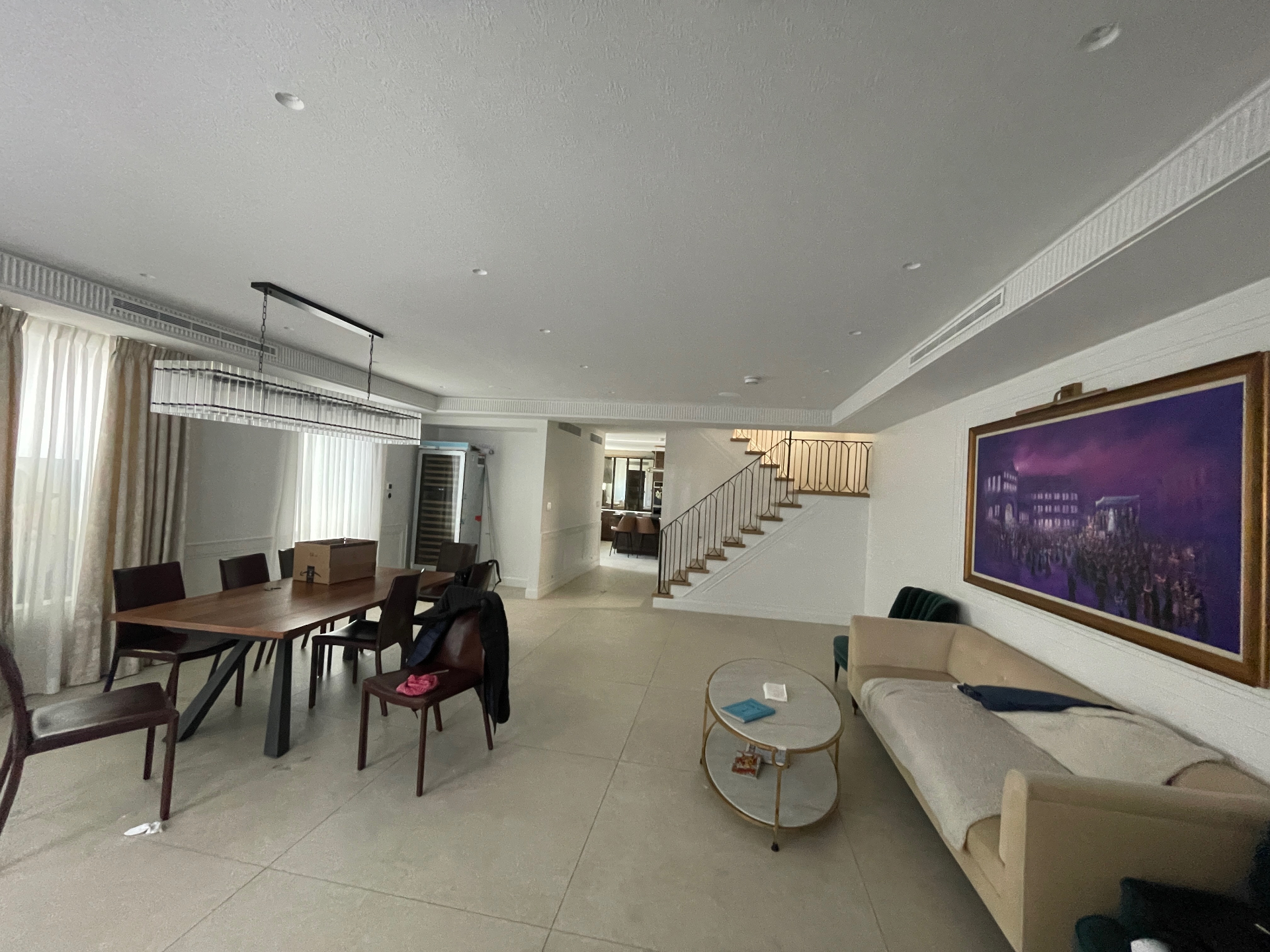 Concealed linear grilles in a duplex living room