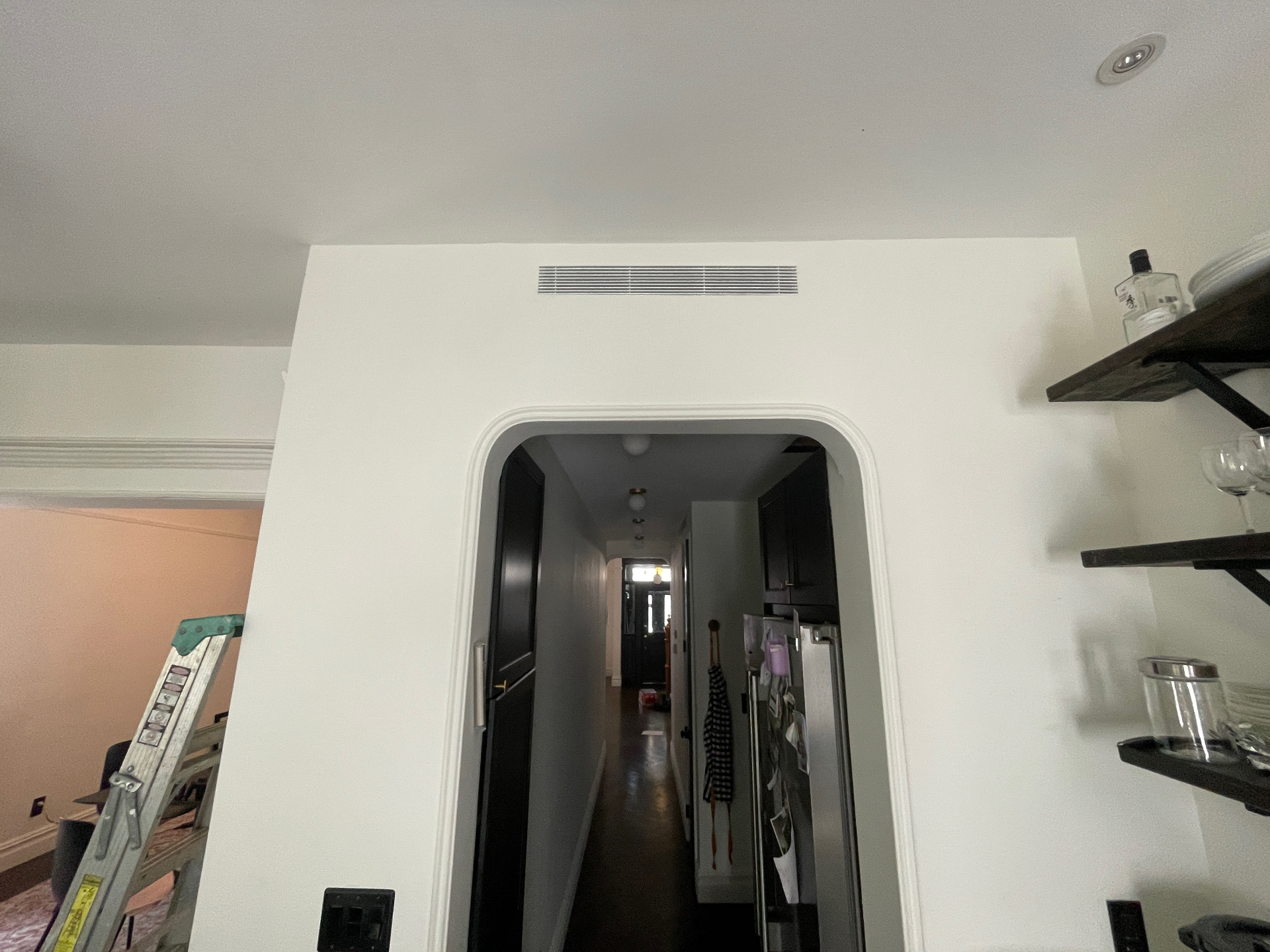 Townhouse hallway with concealed grille